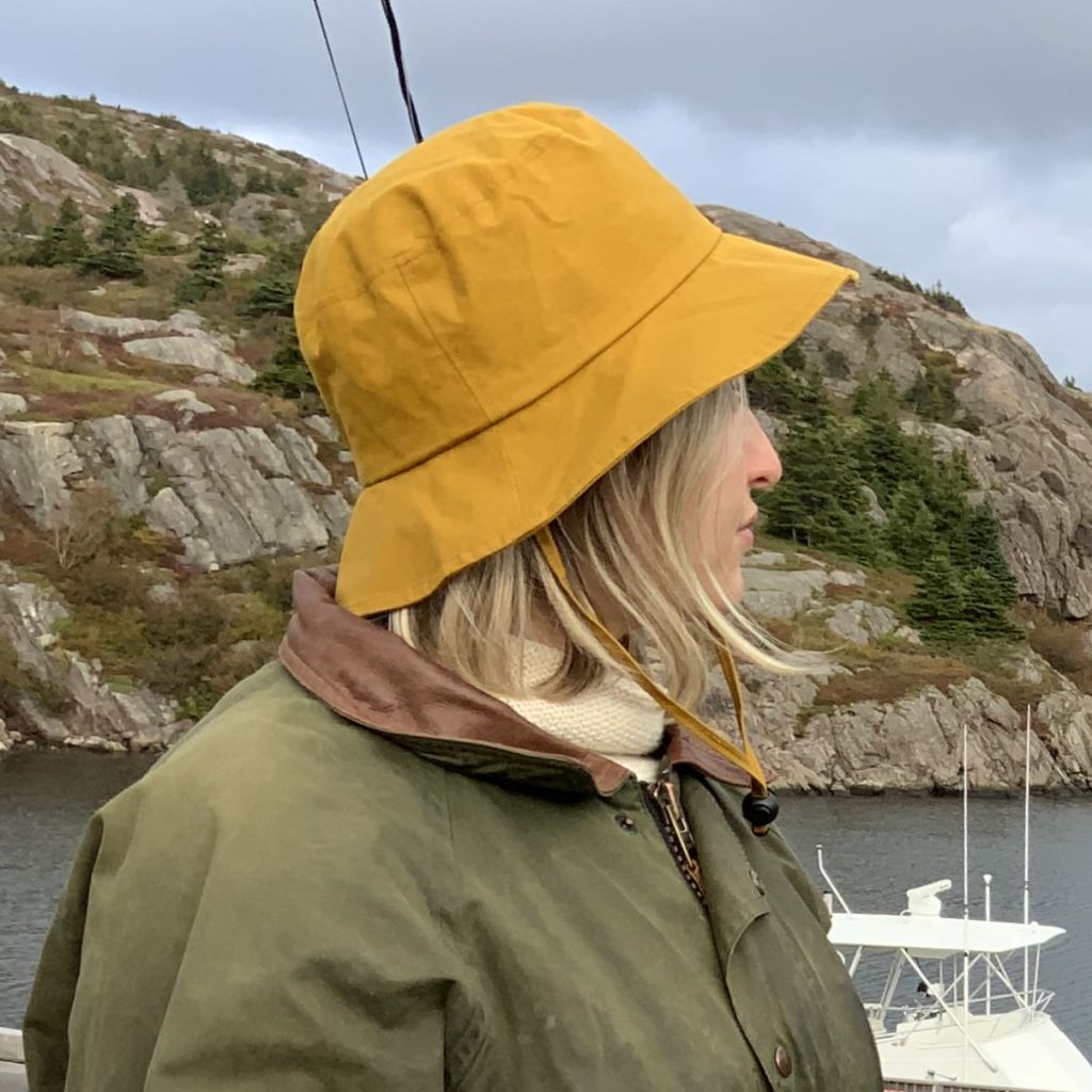 Rugged Dry Oilskin Wax Cotton Rain hat with wind lanyard.  Organic Cotton. Made in Canada by Puffin Gear
