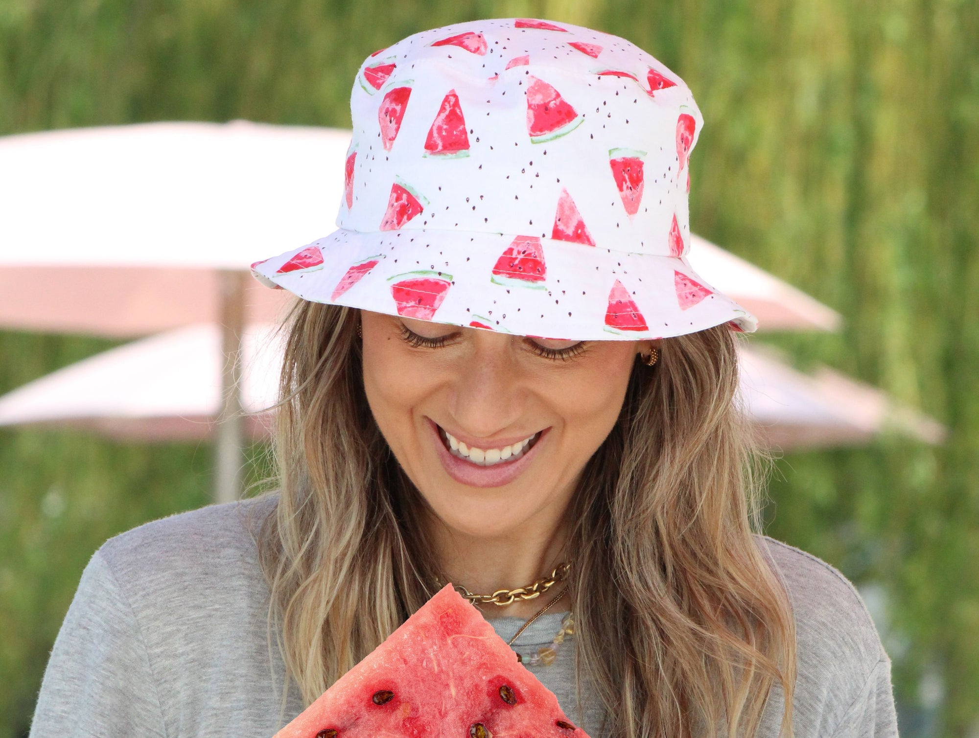 Retro print cotton bucket hats perfect for a beach party, volleyball game or pool party.  Gorgeous garden print wide brim hats for puttering the afternoon away in your garden. UPF50 Sun Protection. Made in Canada by Puffin Gear