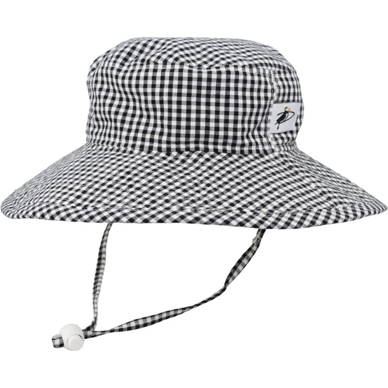 Kids Wide Brim Sunbaby Hat has a chin tie with cord lock and safety break away clip to keep hat safely in place. Tested and rated UPF50+ Excellent Sun Protection so your kid can play outdoors all day. Made in Canada by Puffin Gear-Cotton Print-Black Check