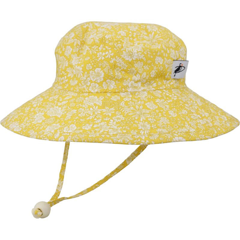 Kids Wide Brim Sunbaby Hat has a chin tie with cord lock and safety break away clip to keep hat safely in place. Tested and rated UPF50+ Excellent Sun Protection so your kid can play outdoors all day. Made in Canada by Puffin Gear-Liberty of London Cotton Prints-Emily Belle-Yellow