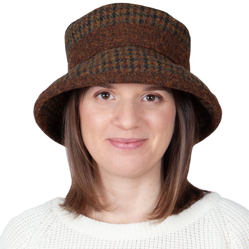 Brimmed harris tweed derby hat in moor check plaid with copper trim. made in canada by puffin gear. winter sun protection